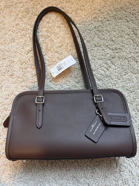 NWT Coach Swing Zip Shoulder
Bag Sliver/Maple CM565